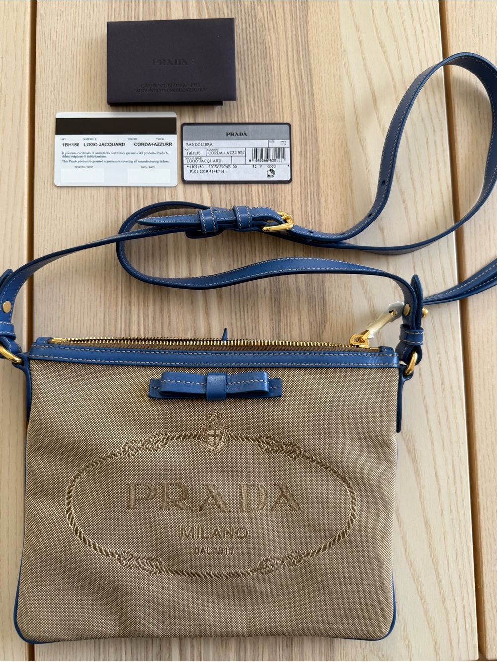 Prada Beige Canvas Crossbody with Blue Leather Trim and Bow